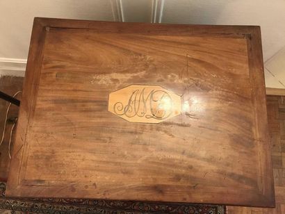 null Mahogany workbench opening by a flap and two drawers, monogrammed top, sheath...