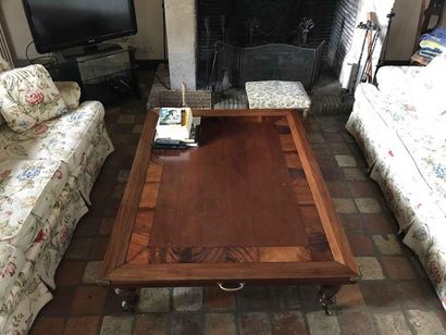 null Rectangular coffee table in natural wood, legs finished with casters Height:...