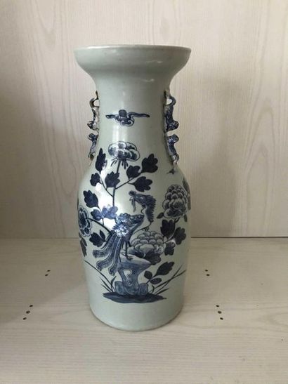 null Large porcelain vase with blue and white decoration of a phoenix in branches...