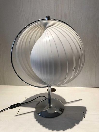 null Chrome-plated metal lamp and white plastic shade.