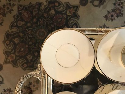 null Coffee service in white and gold porcelain of Limoges including 6 cups and saucers...