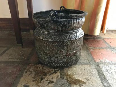 null Metal charcoal bucket with embossed decoration of stylized animals Height: 224cm...