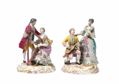 null 130 Pair of porcelain groups of musicians. About 1900. Mark on the 2 groups...