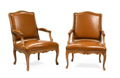 null 252 Pair of natural wood armchairs with flat backs upholstered in fawn leather...