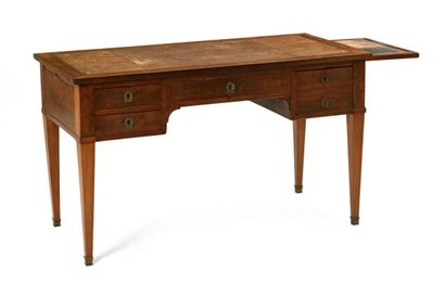 null 248 Mahogany veneered flat desk, the top trimmed with fawn leather with two...