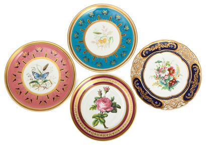 null 119 Four porcelain plates of different models with polychrome decoration of...