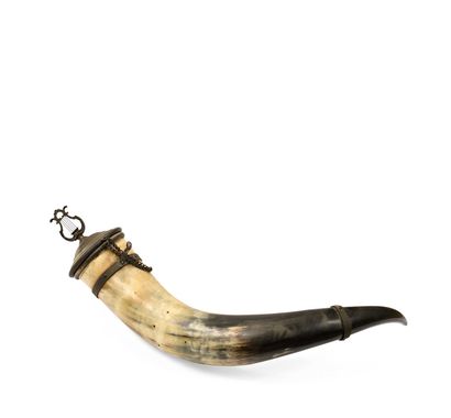 null 219 Large buffalo horn, a stopper mounted in brass closes the upper part, the...