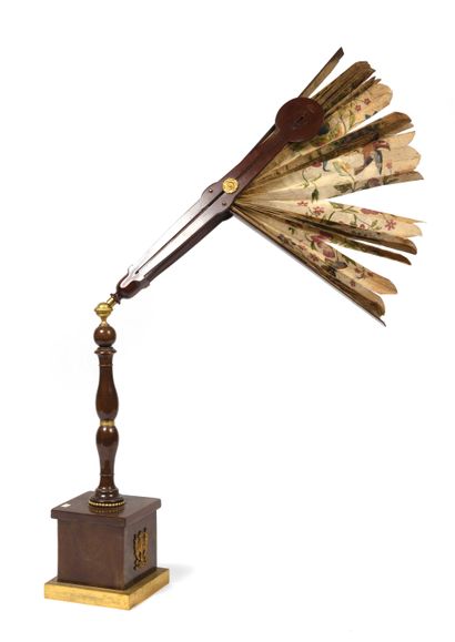 null 249 Mahogany and gilt bronze screen The leaf in painted rice paper. Early 19th...