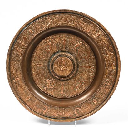 null 274 Round metal dish with neoclassical decoration in the Renaissance style....