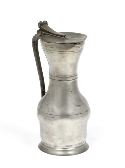 null 147 JOINVILLE Pewter baluster pitcher. Marked on the lid: 1) C crowned / IONVIL...
