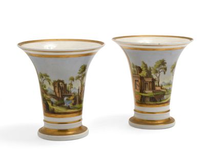 null 124 A pair of white and gold porcelain horn vases with polychrome reserve of...