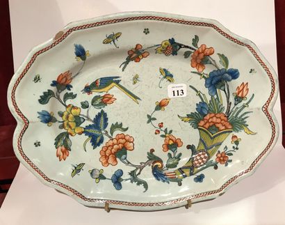 null 113 England Fine earthenware oval dish with printed peacock decoration on terrace....