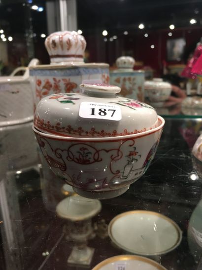 null 187 China A small porcelain bowl and cover with polychrome decoration of animated...
