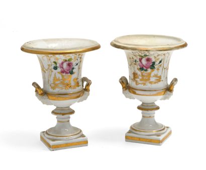 null 123 A pair of white and gold Paris porcelain Medici vases decorated with roses...