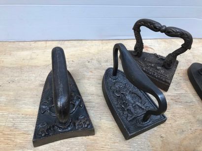 null Ref: 79 Six cast iron irons, all with marks, late 19th century.