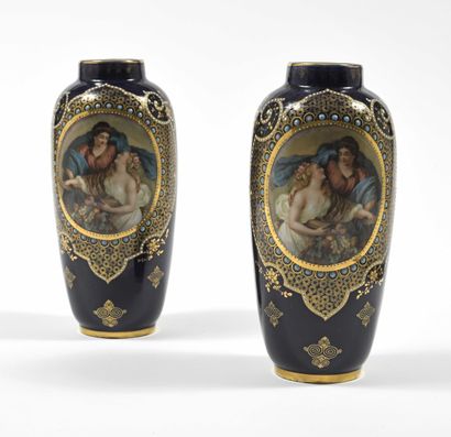 null Pair of porcelain vases decorated with allegorical scenes in reserves, on a...