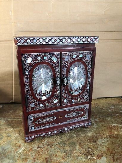 null Jewelry box in stained wood and mother of pearl decoration.