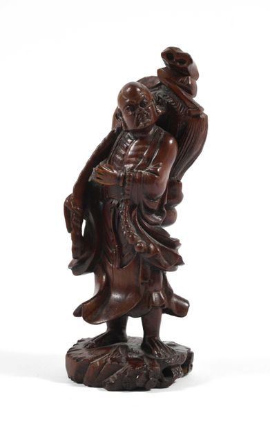null 183 Carved wooden figure of a man. China circa 1920. 16cm