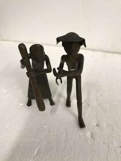 null Two African statuettes in bronze. 

The woman : 15,5 cm

The man : 16,5 cm