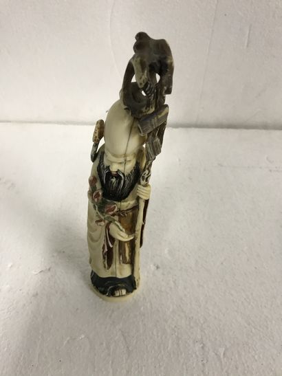 null CHINA. Sage and his rod of longevity. Marked under the base. 

Ivory, polychrome.

19th...