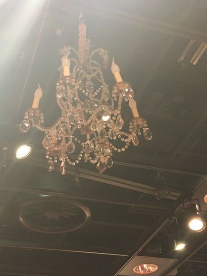 null 
Gilded metal chandelier with six arms and glass pendants