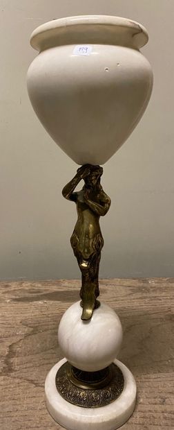 null A bronze and alabaster lamp decorated with a woman as a marine animal. Napoleon...