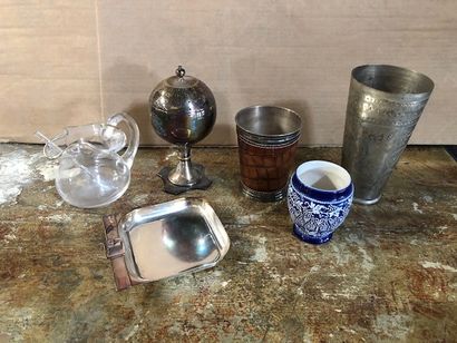 null Lot including a translucent glass water jug, an oval-shaped sprinkler on a silver...
