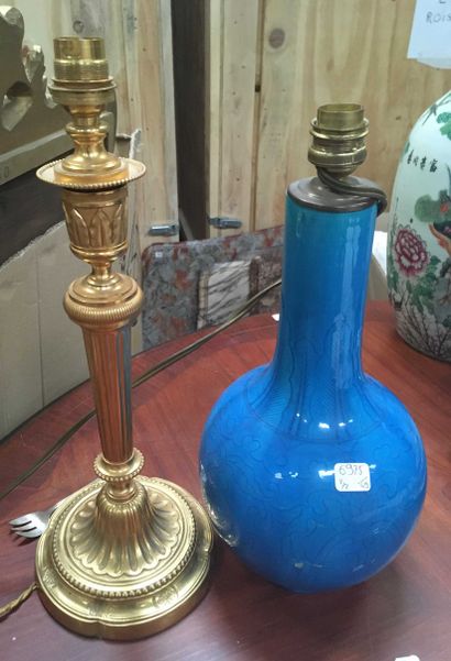 null Three ceramic vases, ormolu lamp base in the Louis XVI style