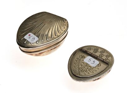 null 20 Two shell snuffboxes, one with a silver plated frame with engraved decoration...