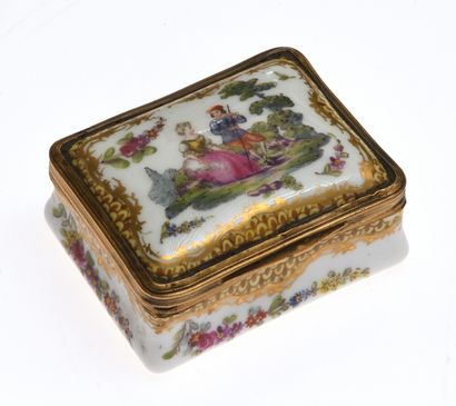null 16 Two small polychrome porcelain boxes and a snuffbox in the Meissen taste,...
