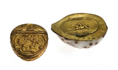 null 21 Two shell snuffboxes, one with a metal frame decorated with a horse and rider,...