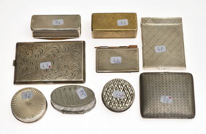 null 12 Snuffboxes, boxes, cigarette holders and a card holder in silver with engraved...