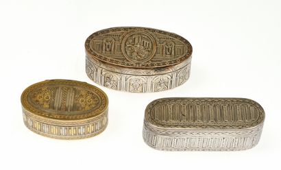 null 11 Three oval boxes or snuffboxes, one silver and vermeil decorated with fluting...