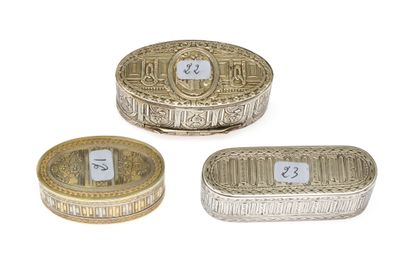 null 11 Three oval boxes or snuffboxes, one silver and vermeil decorated with fluting...