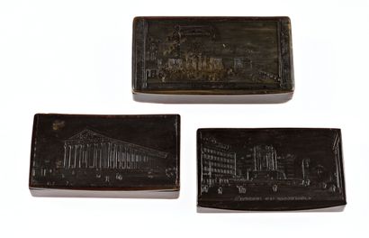 null 43 Three rectangular horn snuffboxes, the hinged lids depicting Parisian monuments:...