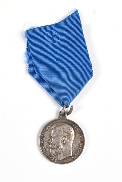 null Médaille pour le zèle, au profil de Nicolas II. Argent. Ruban et anneau postérieurs....