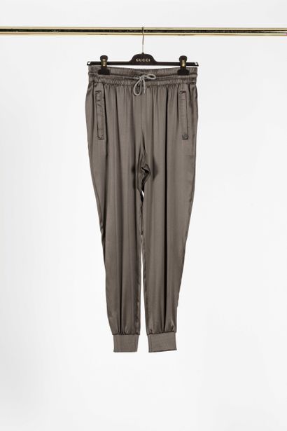 null GUCCI : sportswear trousers in bronze silk, tightened at the waist by a lace,...