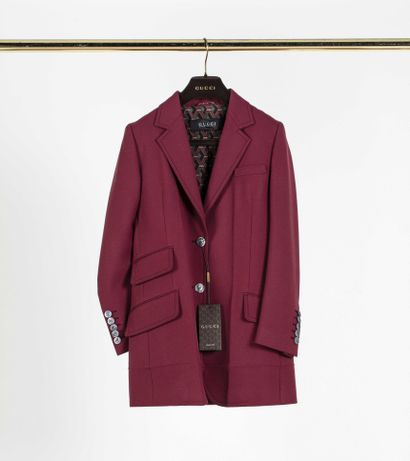 null GUCCI: trouser suit in burgundy wool comprising straight trousers and a jacket...