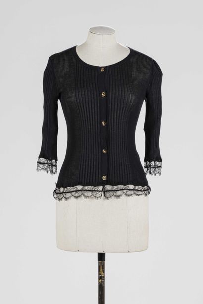 null EMILIO PUCCI: black wool and silk waistcoat, trimmed with lace on the sleeves...