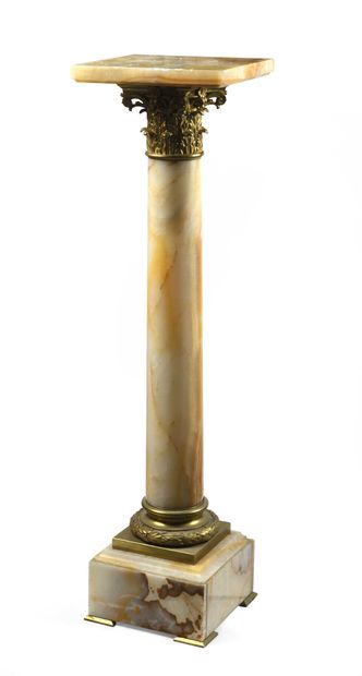 null Column in onyx and chased and gilded bronze with Corinthian capital and base...
