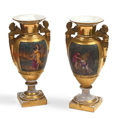 null Pair of Paris porcelain Medici vases, decorated in polychrome with scenes of...