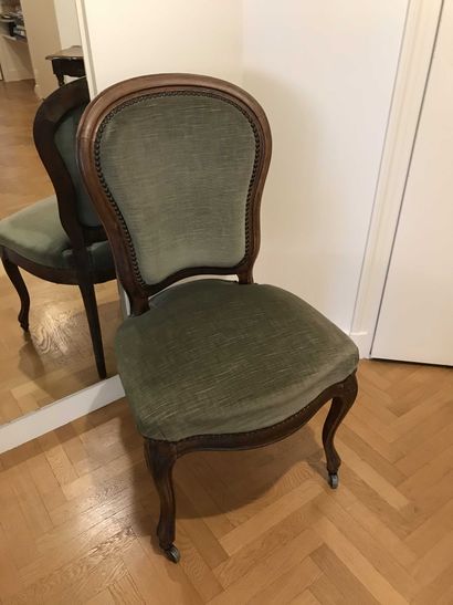 null Mahogany chair with rounded back and legs finished with casters Louis Philippe...