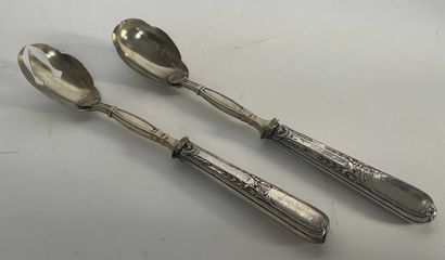 null Serving utensils in filled silver.