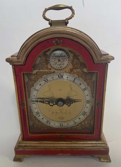 null Chinese clock in red lacquered wood.