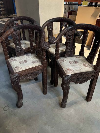 null Suite of four armchairs in carved and molded natural wood, in the taste of the...