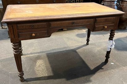 null Wooden desk, opening with five drawers, the feet balusters turned and fluted...