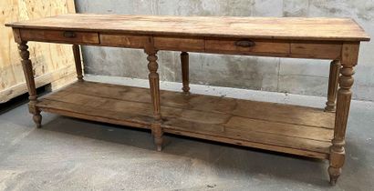 null Important console in natural wood, opening with two drawers and resting on six...