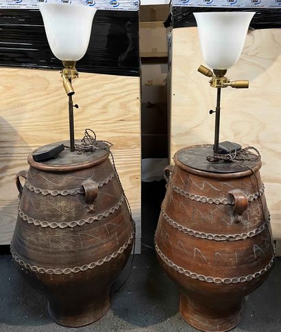 null Pair of earthenware jars mounted as a lamp, the lampshade in opaline. Height...