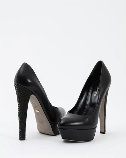 null SERGIO ROSSI: black leather platform pumps, stingray style heels. S. 39Ht. Heel:...