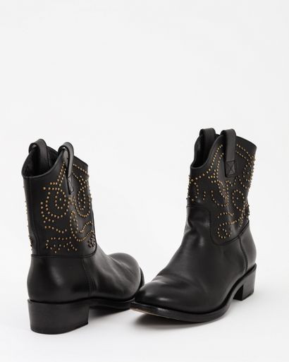 null SERGIO ROSSI : boots en cuir noir à décor de clous en métal doré formant des...